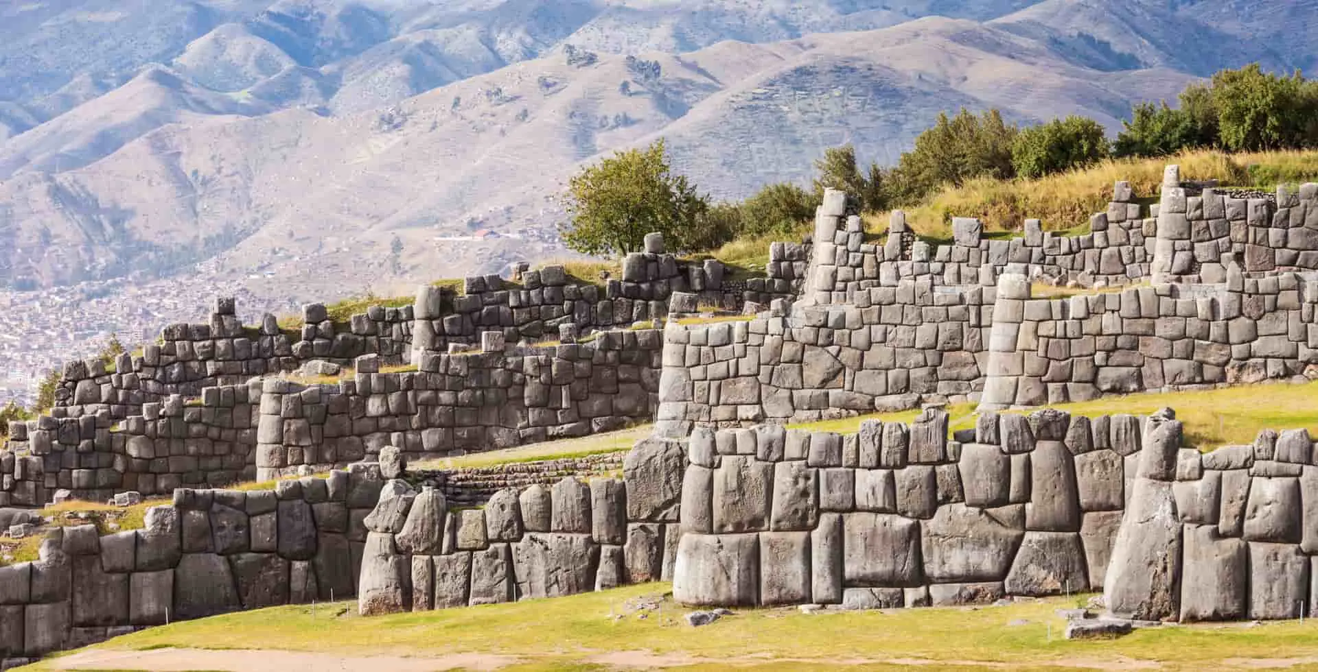 Incan stonework explained during a Cusco tour with English guide
