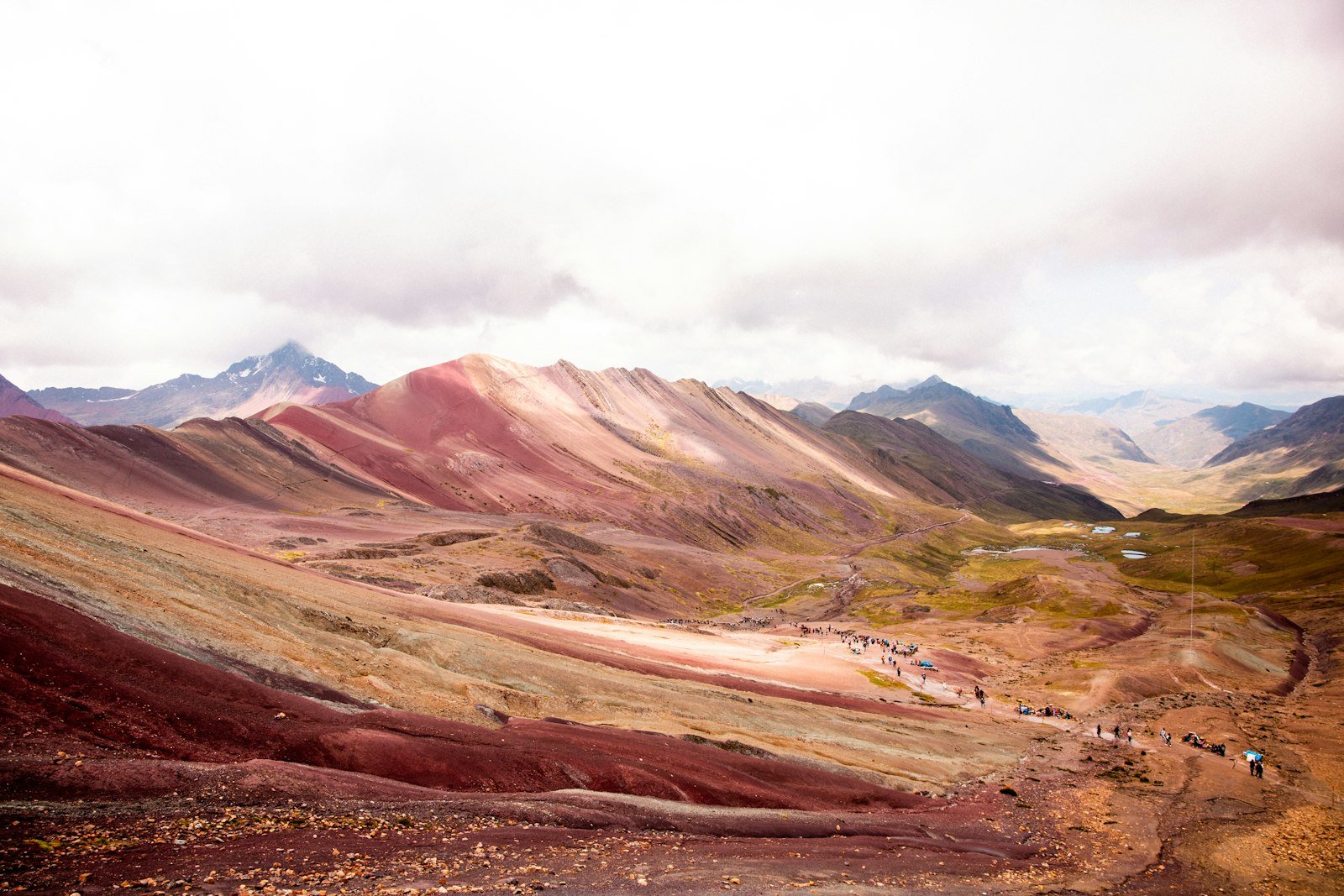 Hikers on the trail to Rainbow Mountain Peru from Cusco
