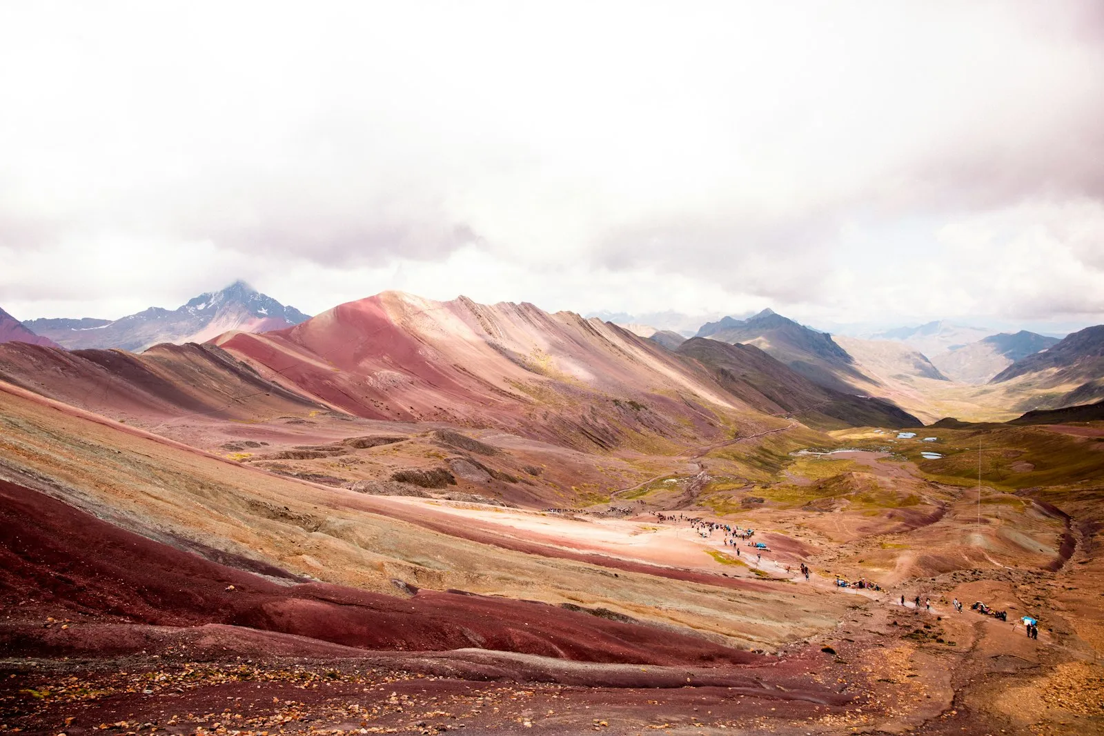 Hikers on the trail to Rainbow Mountain Peru from Cusco