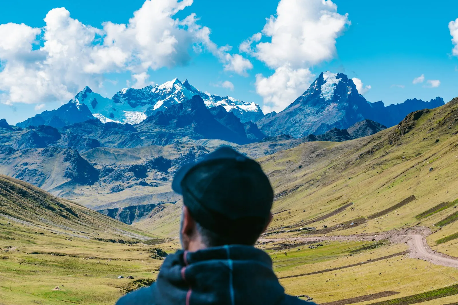 Tourist hiking a scenic mountain trail in Peru